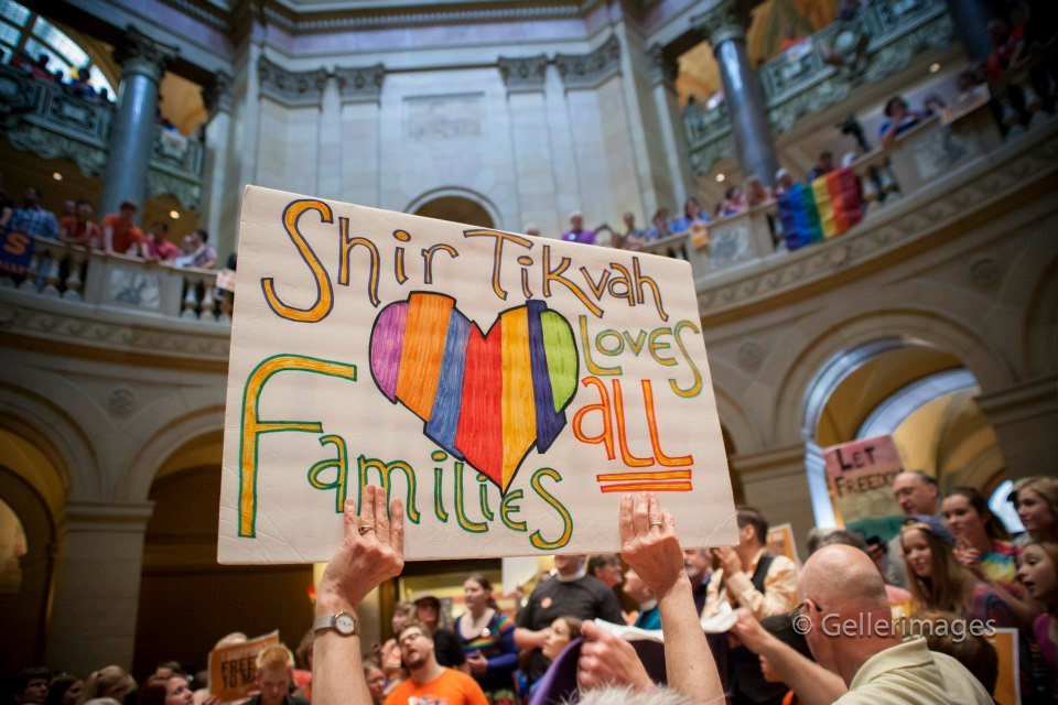 http://people.carleton.edu/~cborn/omeka/ShirTikvah/ST_LovesAllFamiliesSign.jpg http://people.carleton.edu/~cborn/omeka/ShirTikvah/ST_LovesAllFamiliesSign.jpg