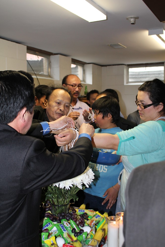 Tying of White Strings for Good Fortune.jpg
