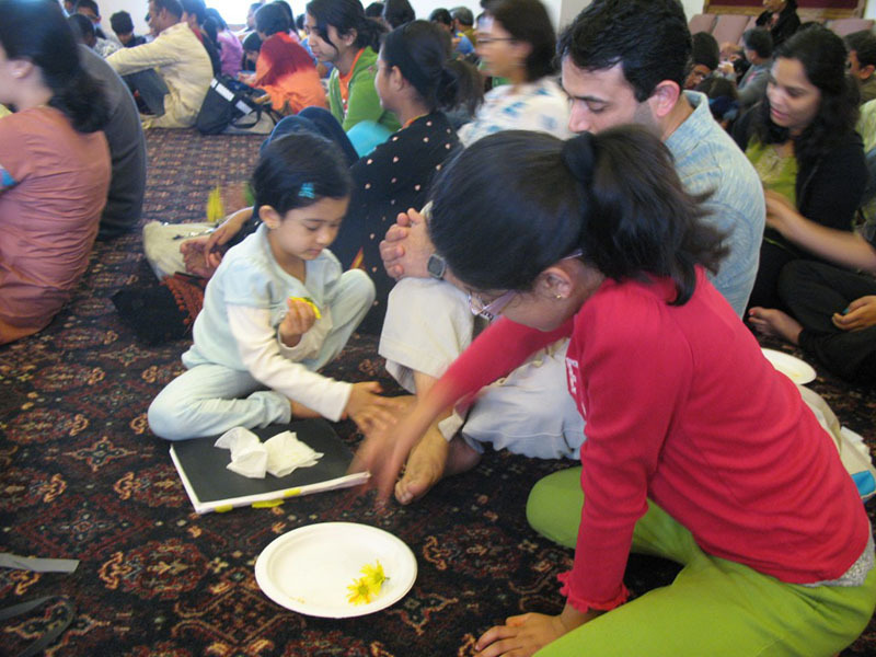 http://people.carleton.edu/~cborn/omeka/Chinmaya_Mission_Twin-Cities/CMTC_ParentsFeetWiping.jpg