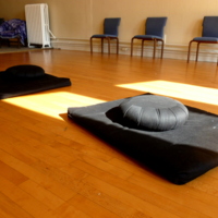 http://people.carleton.edu/~cborn/omeka/Northfield_Buddhist_Meditation_Center/NBMC_Mats_Pillows_and_Chairs2.jpg