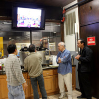 Temple Visitors Partake in Tea