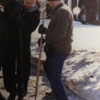 Members shovel sidewalk in front of synagogue
